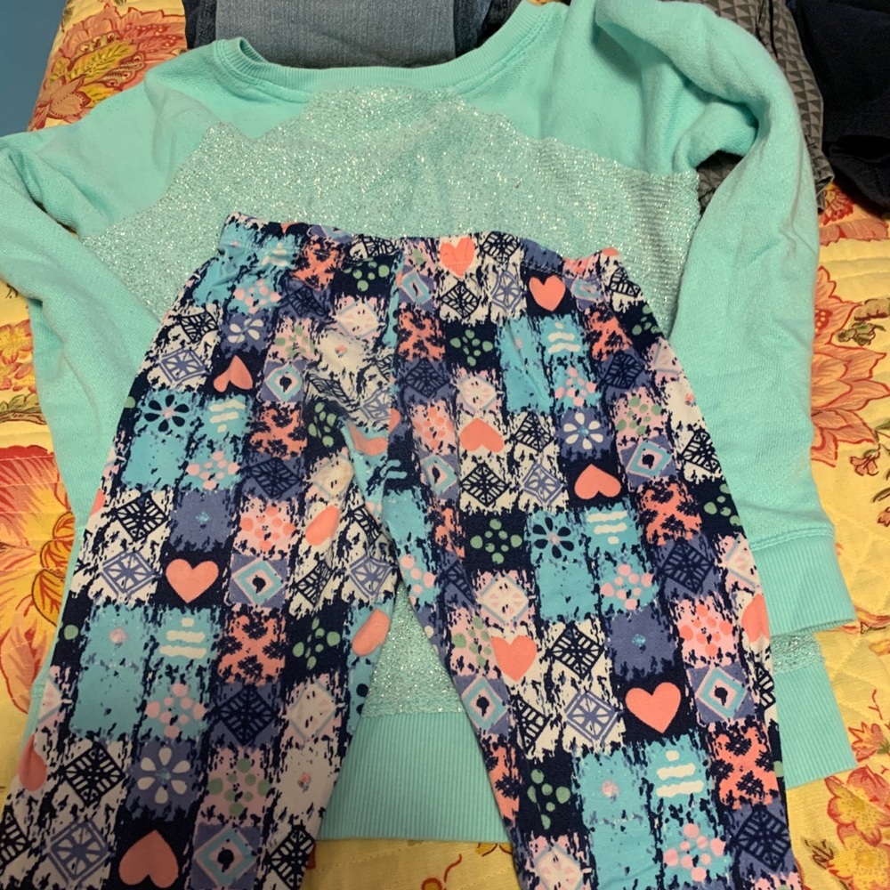 Cute sea foam green top with colorful leggings